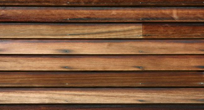 Faded stained wooden siding